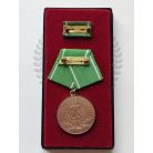 East Germany DDR Police Medal “For Outstanding Achievements” in Bronze with award certificate and case