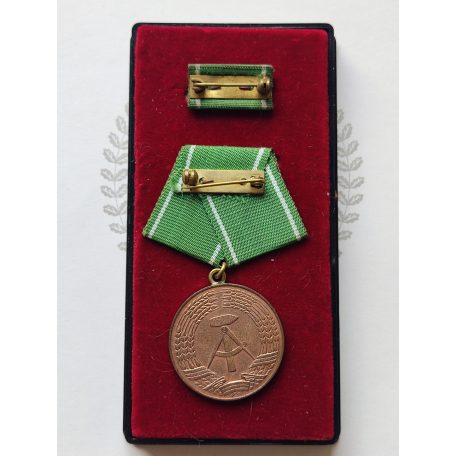 East Germany DDR Police Medal “For Outstanding Achievements” in Bronze with award certificate and case