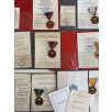   Hungarian Large 9 medal & badge lot with award folders to a senior Peoples Army NCO