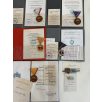   Hungarian Large 9 medal & badge lot with award folders to a senior Peoples Army NCO