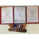 Hungarian 9 medals mounted medal bar w/ award certificates to a Peoples Army staff officer