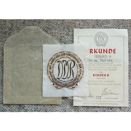 East German Sport Badge for Juniors (B) with issue envelope and award certificate 1963