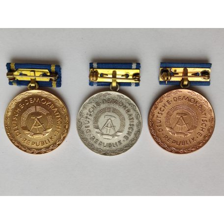 East German DDR Pestalozzi Medals "For Faithful Service" Set Gold, Silver, Bronze