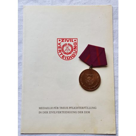 East German Civil Defence Zivilverteidigung der DDR Medal with award certificate