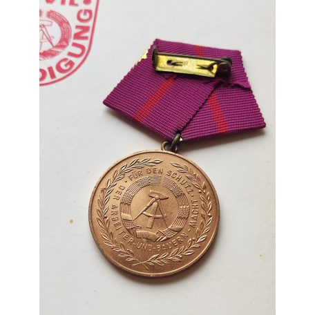 East German Civil Defence Zivilverteidigung der DDR Medal with award certificate